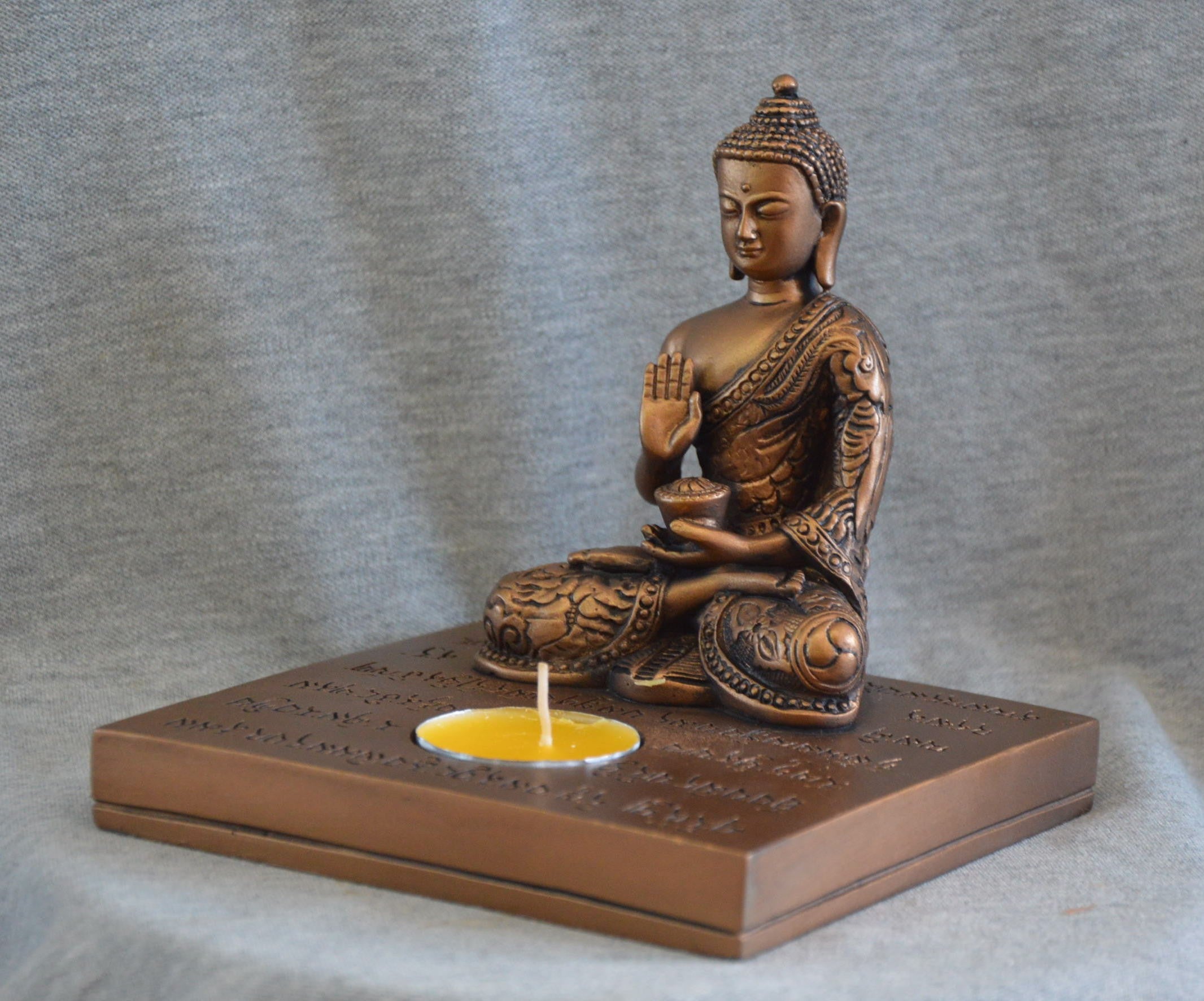 Buddha figur med fyrfadslys 1