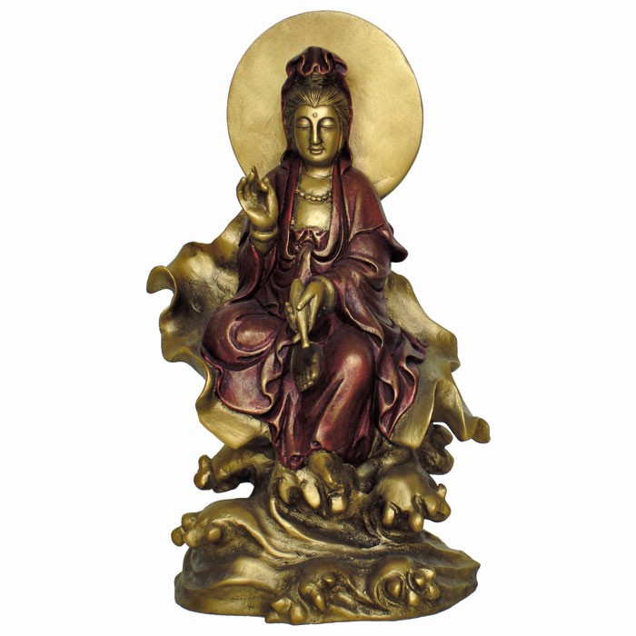 Kuan-Yin siddende på et blad