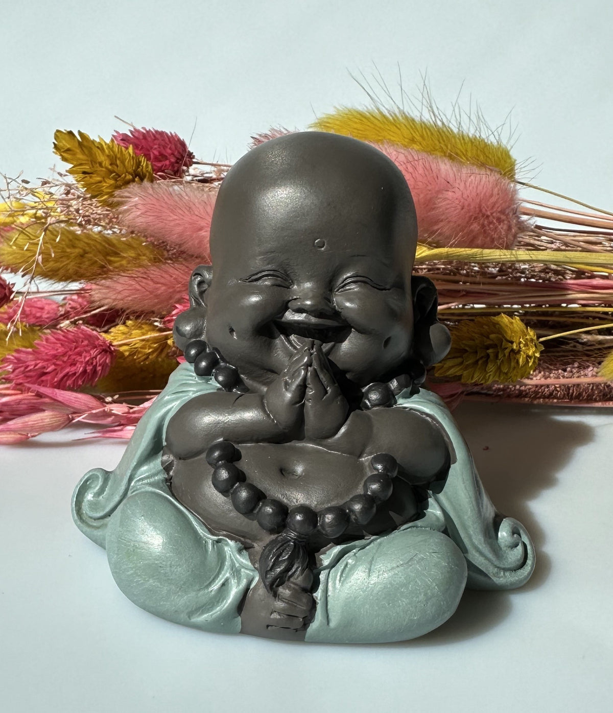 Buddha grinende 1