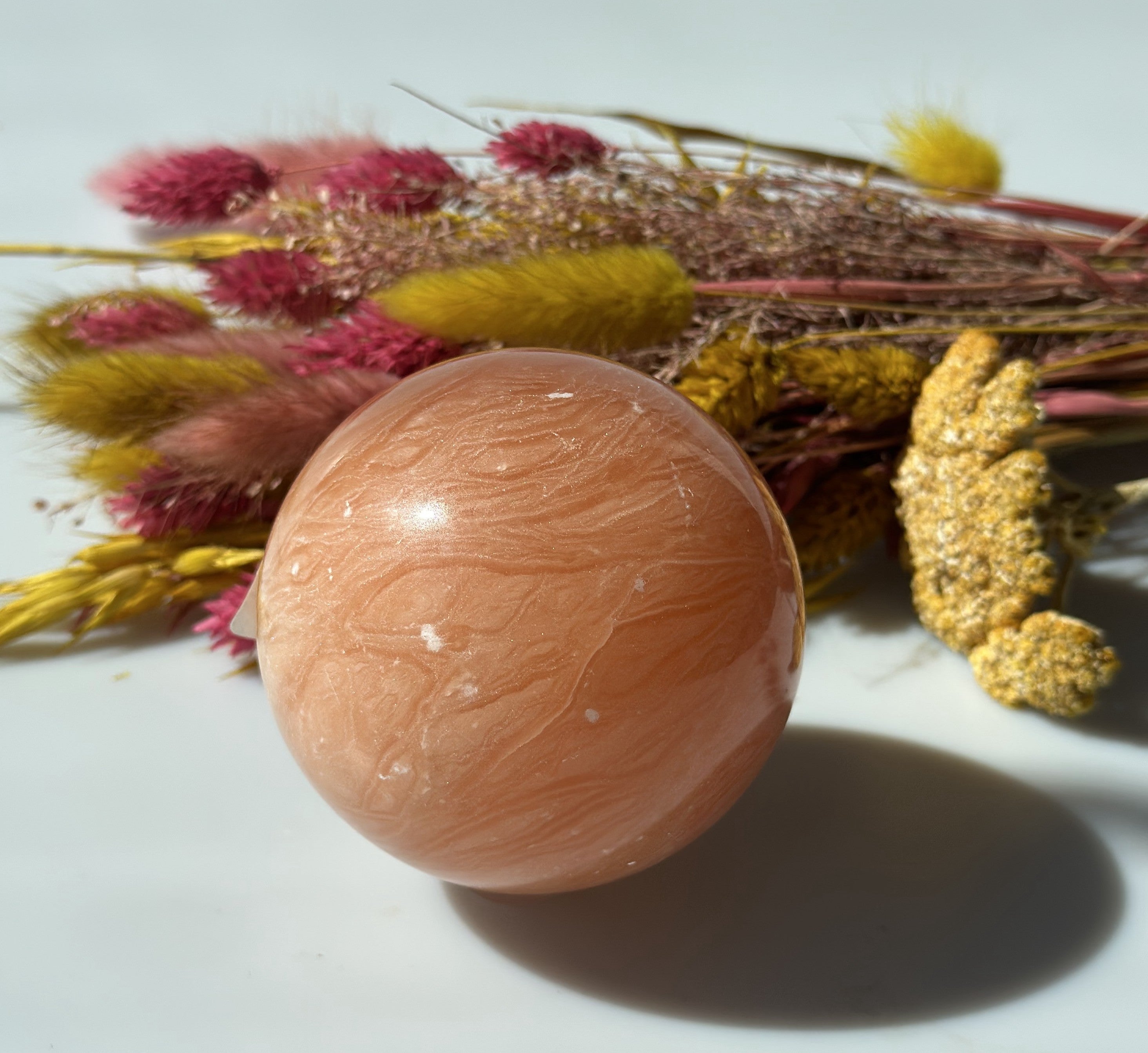 Orange calcit kugle 7,5 cm 2