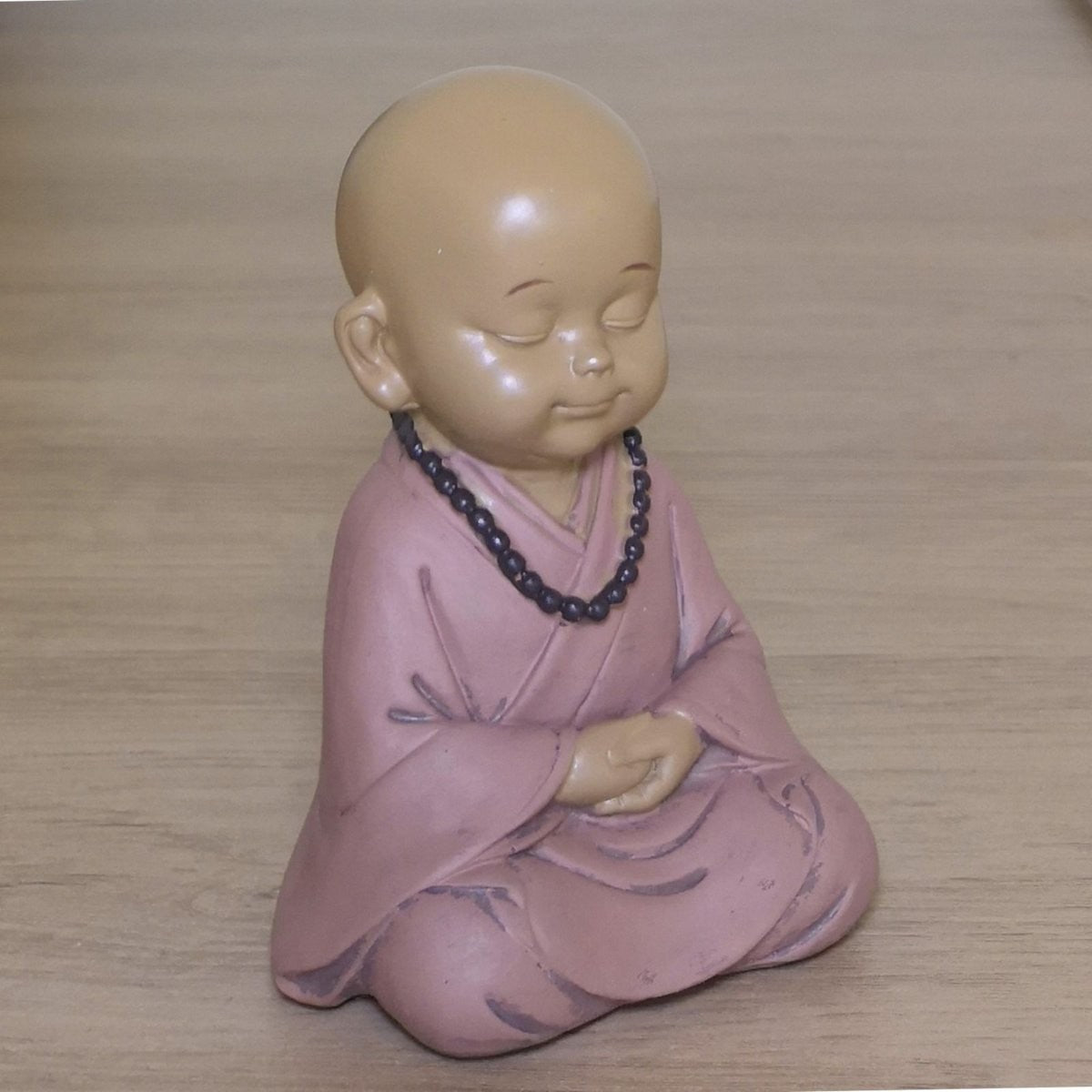 Bedende buddha rosa 1