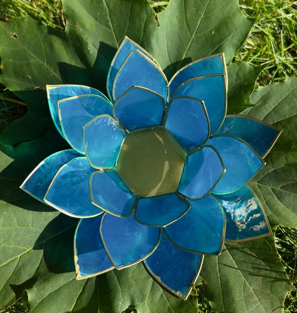 Lotus lysestage tyrkis guld 1