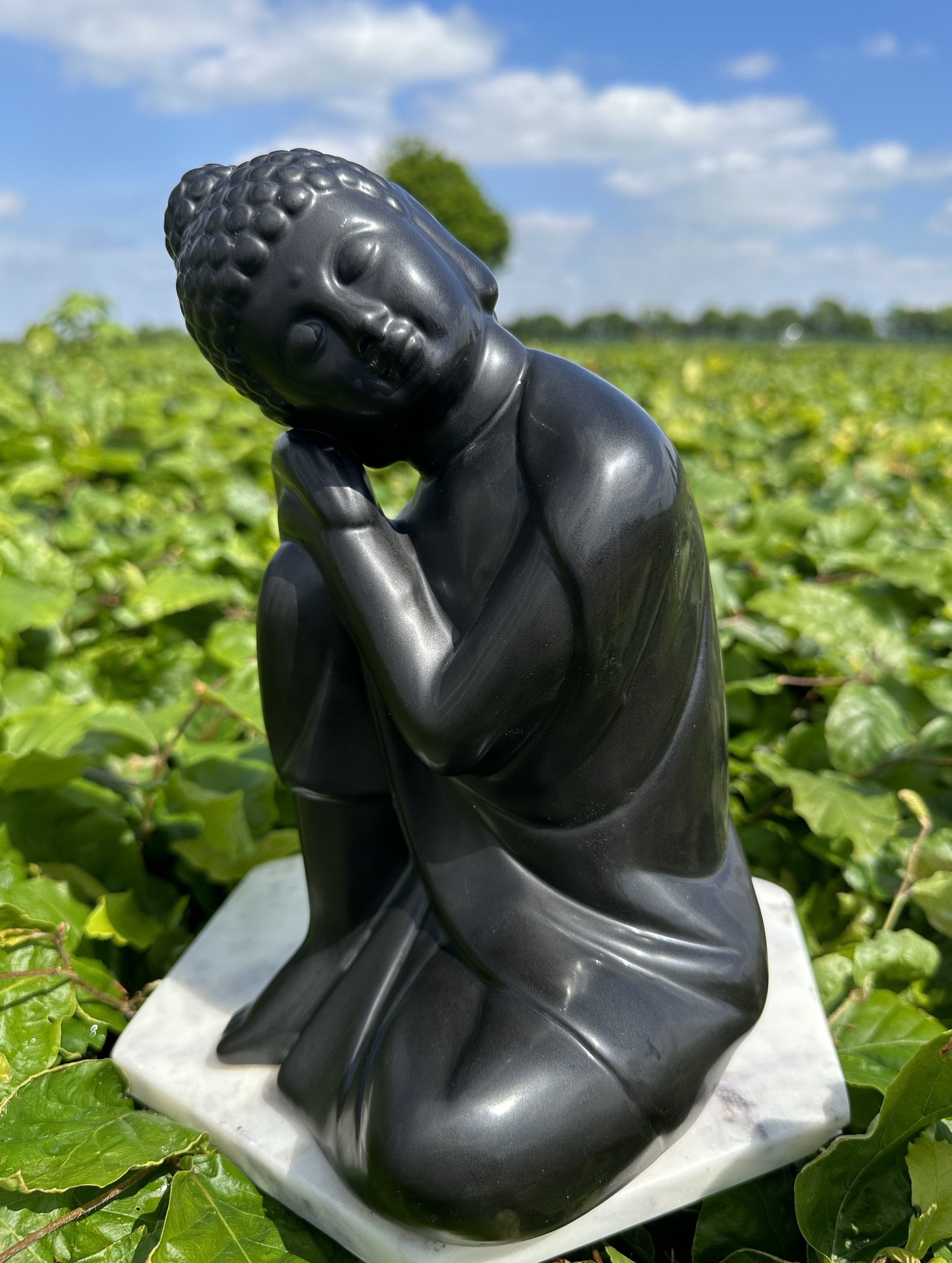 Siddende buddha sort 1